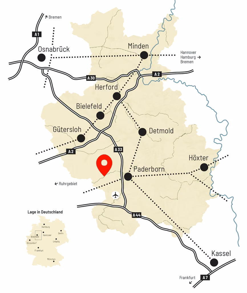 Karte von Ostwestfalen-Lippe mit Autobahnen und Städten wie Bielefeld, Gütersloh und Paderborn. Ein roter Marker zeigt den Standort von Reker Holzbearbeitung.